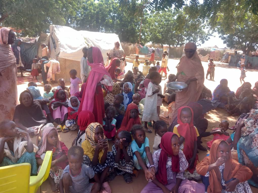 Displaced women and children participating in psychosocial support and group activities at Zamzam IDP Camp