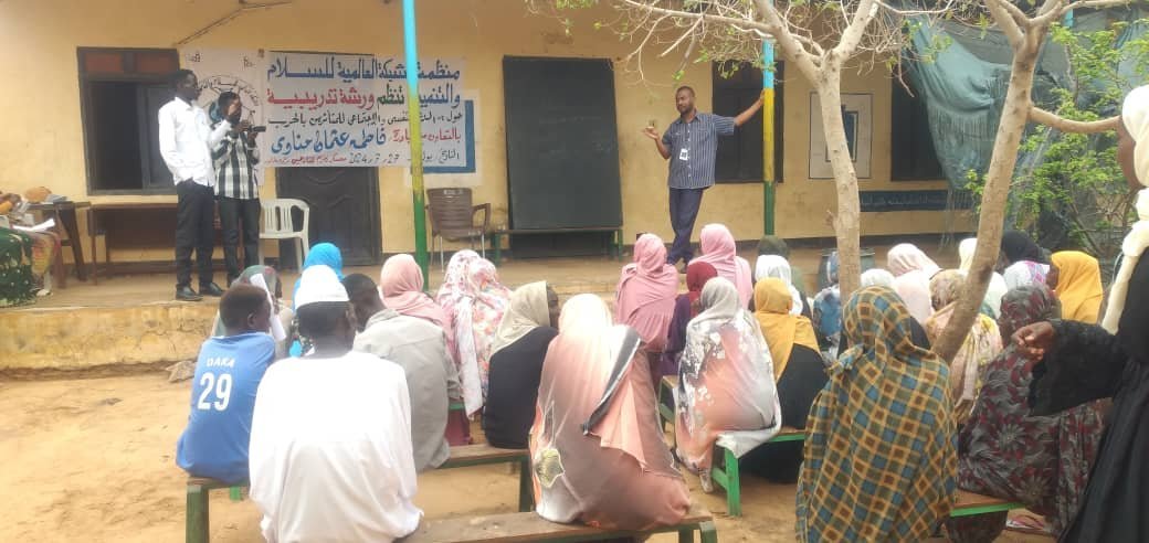 Displaced families in El Fasher receiving food baskets and participating in recreational trauma relief activities